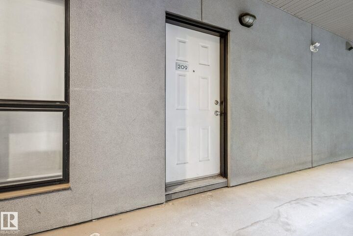 Property Photo: 10518 113 Street NW 209 AB T5H 0C6