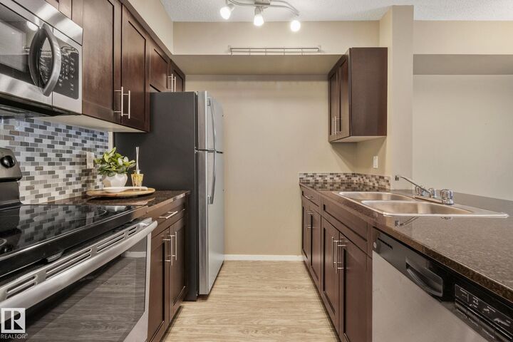 Property Photo: 3315 James Mowatt Trail SW 132 AB T6W 3L6