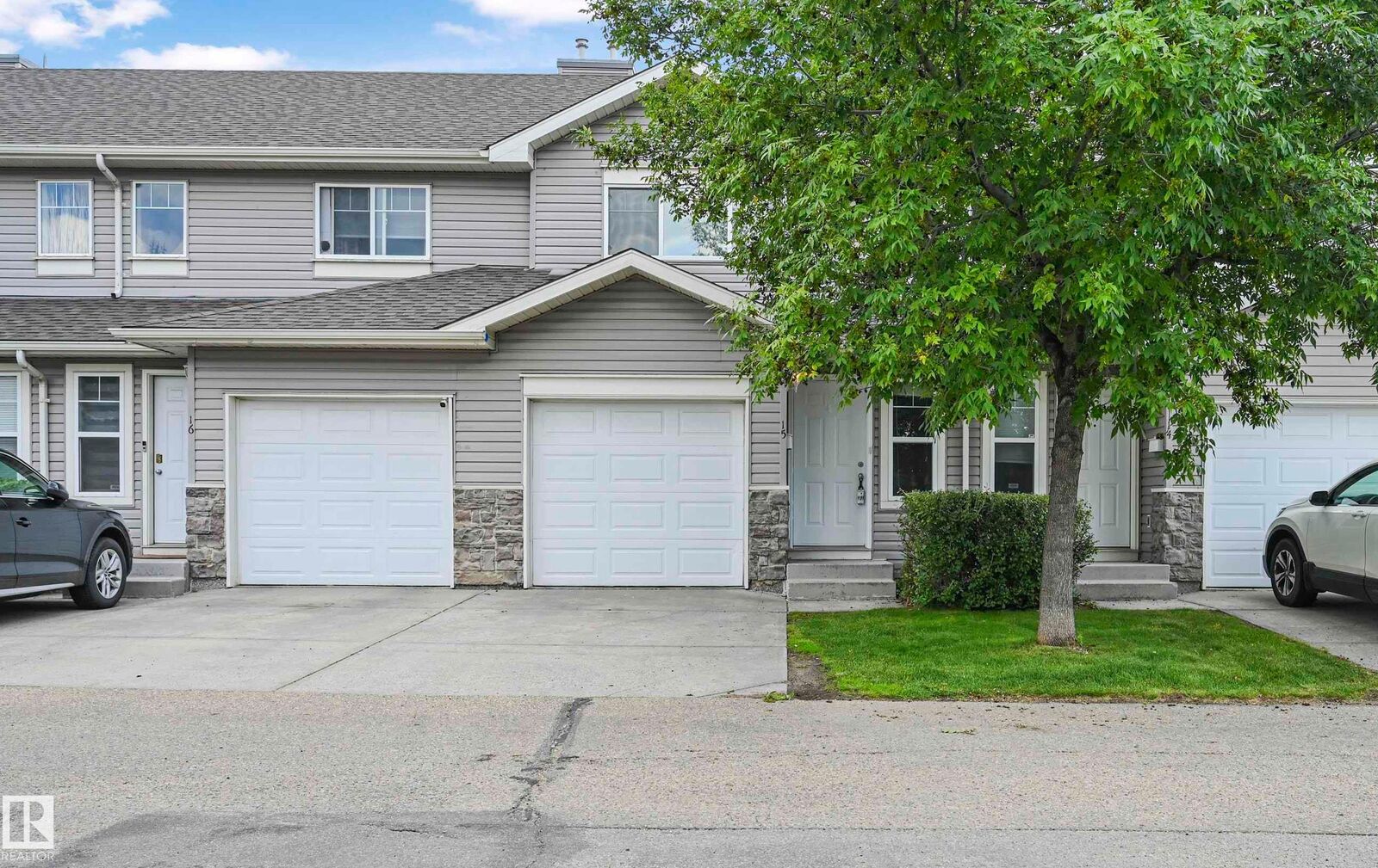 Property Photo: 230 Edwards Drive SW 15 AB T6X 1G7