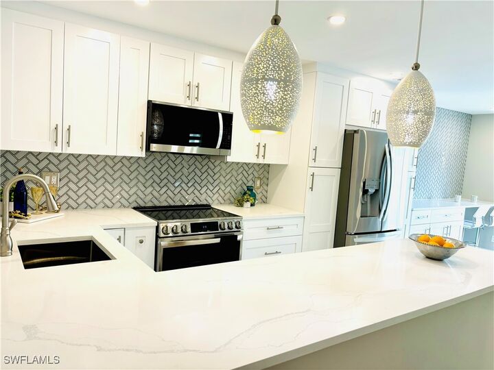 Property Photo:  1455 Curlew Avenue 1  FL 34102 