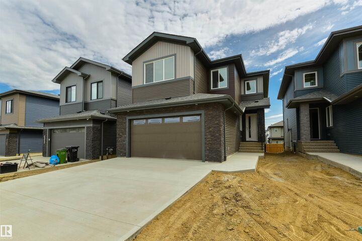 Property Photo:  5449 Kootook Road SW  AB T6W 4W1 