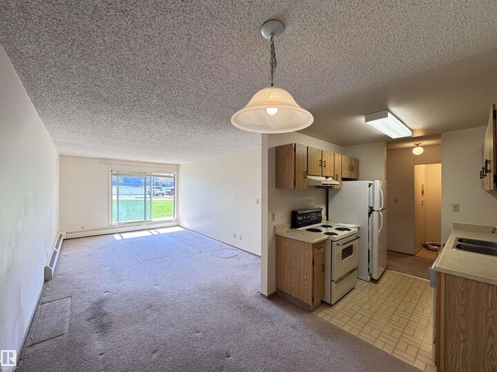Property Photo: 10511 19 Avenue NW 110 AB T6T 5S8