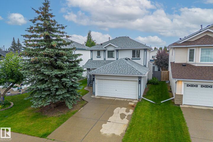 Property Photo: 209 Bancroft Close NW AB T5T 6B5