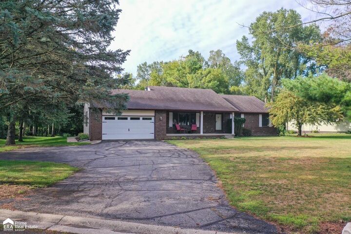 Property Photo:  9607 Larch Lane  MI 48178 