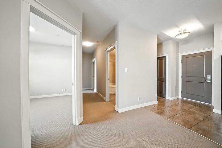 Photo de la propriété: 100 Lakeway Boulevard 218 AB T4S 0A4