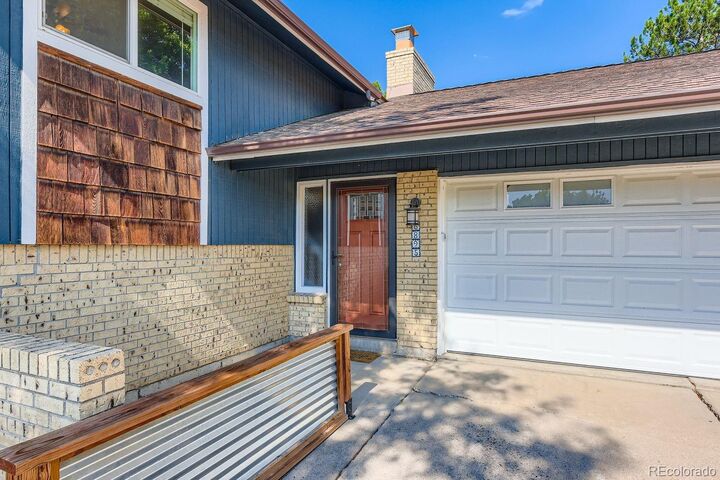 Property Photo:  6895 S Webster Street  CO 80128 