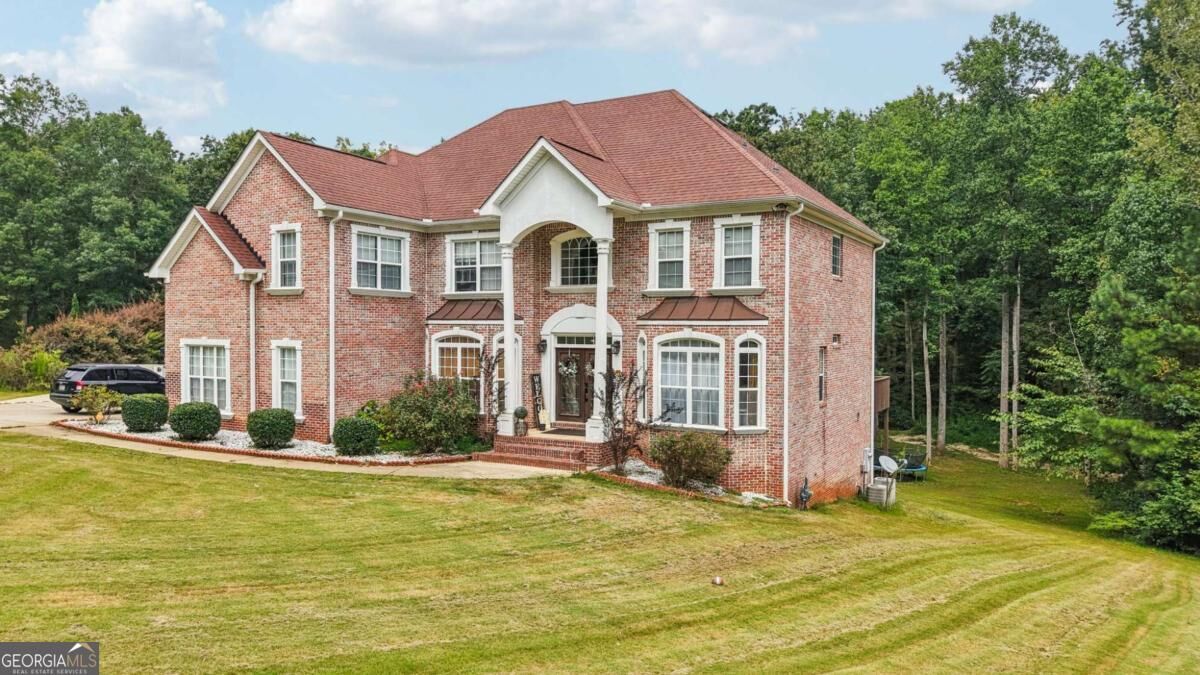 Property Photo:  216 Johns Creek Lane  GA 30281 