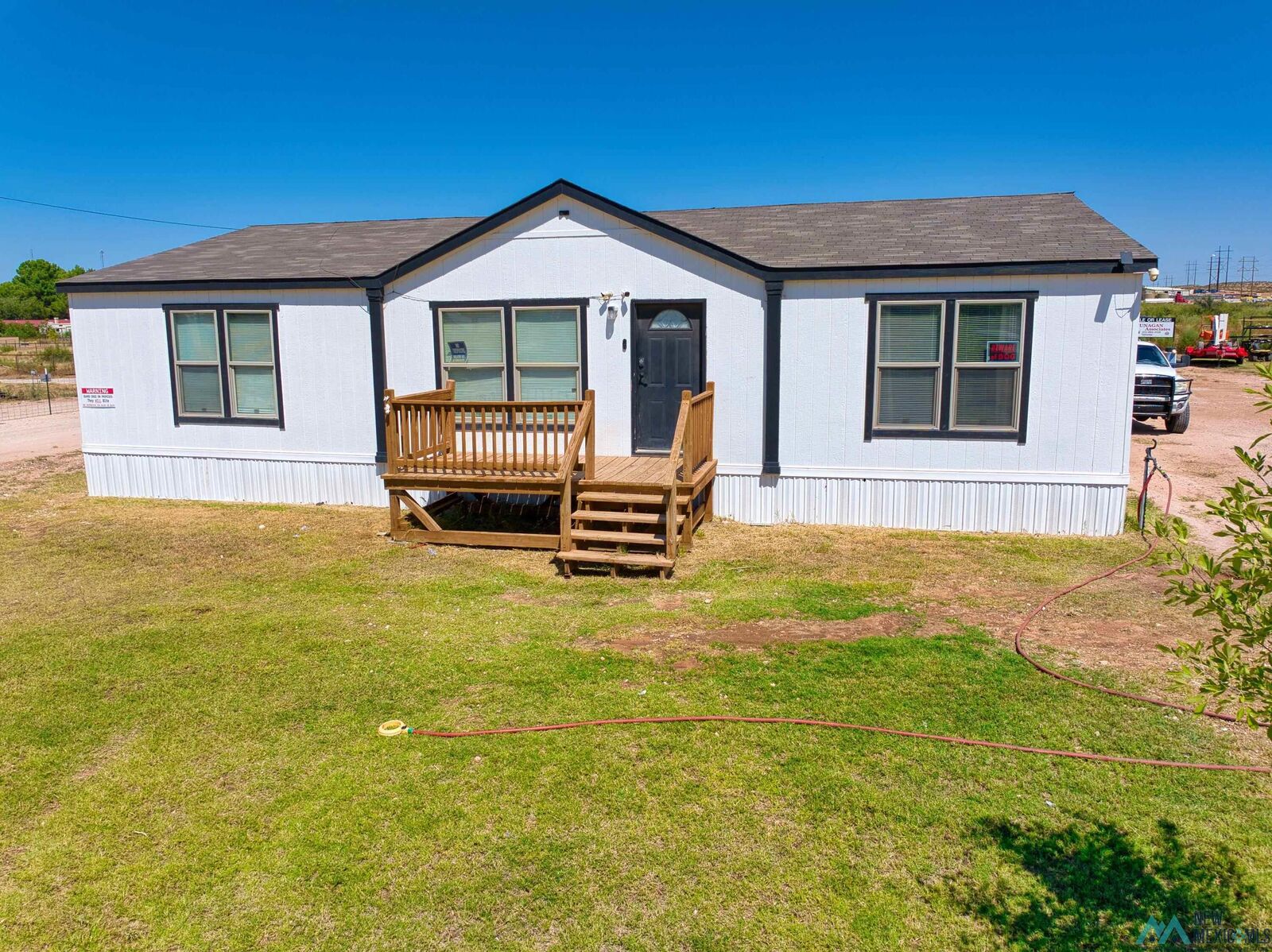 Property Photo:  1402 E Orchard Lane  NM 88220-9275 
