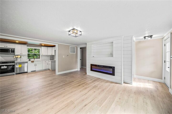Property Photo:  8341 Nowlen Street  OH 44060 