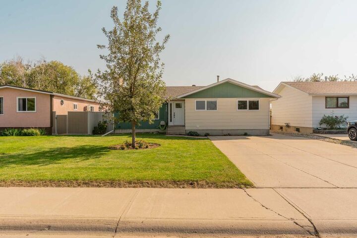Property Photo: 4820 62 Avenue AB T1G 1J2