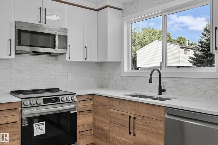 Property Photo:  416 Hermitage Road NW  AB T5A 3K9 