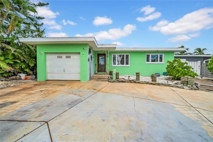 Property Photo:  17714 Long Point Drive  FL 33708 