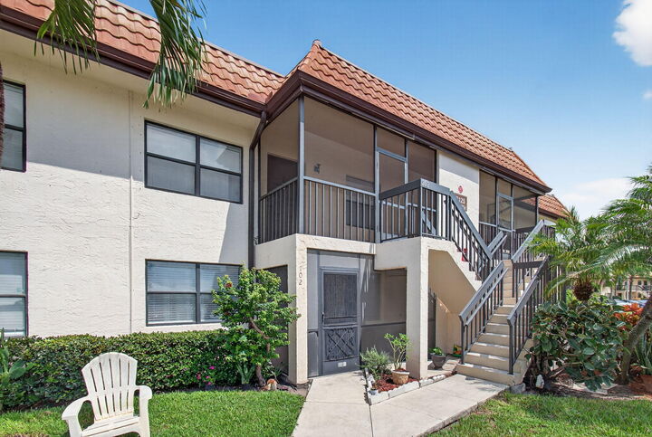 Property Photo: 7125 Golf Colony Court 202 FL 33467