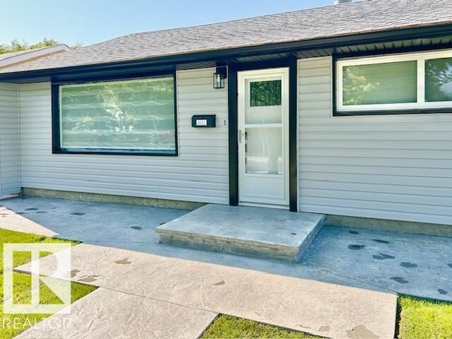 Property Photo:  8811 130A Avenue NW  AB T5E 0V7 