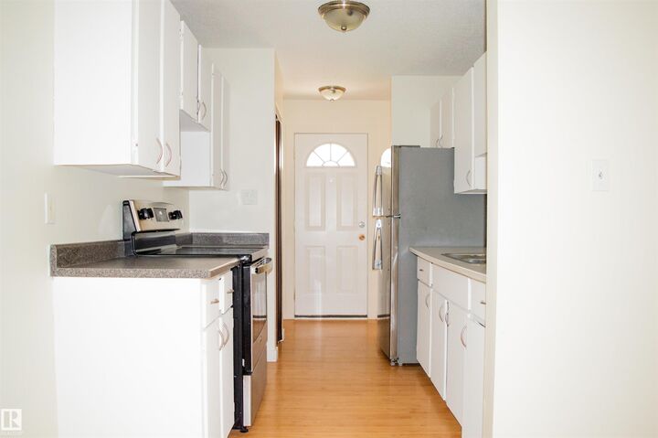 Property Photo:  18241 84 Avenue NW  AB T5T 1T7 