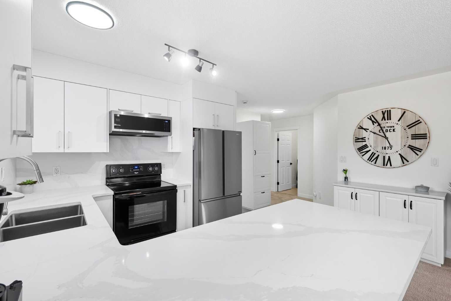 Property Photo:  7451 Springbank Boulevard SW 1211  AB T3H 4K5 