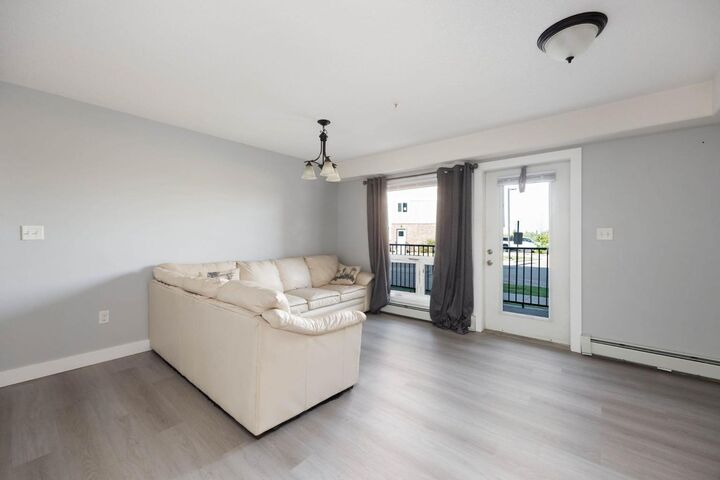 Property Photo:  248B Grosbeak Way 101  AB T9K 0V9 