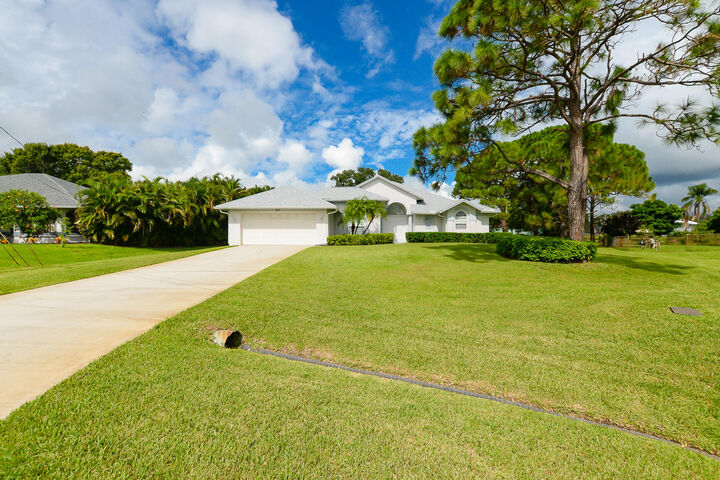 Property Photo:  311 SE Fisk Road  FL 34984 