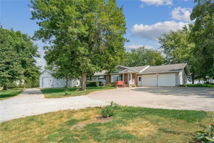Property Photo:  5758 20th Ave Dr  IA 52349 