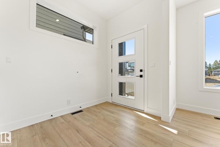 Property Photo:  103 Newbury Ci  AB T8B 0E8 