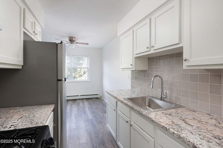26 Windsor Terrace G  Freehold NJ 07728 photo