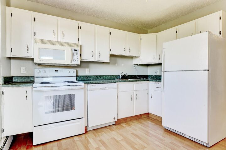 Property Photo: 7201 Poplar Drive 2212 AB T8V 6C5