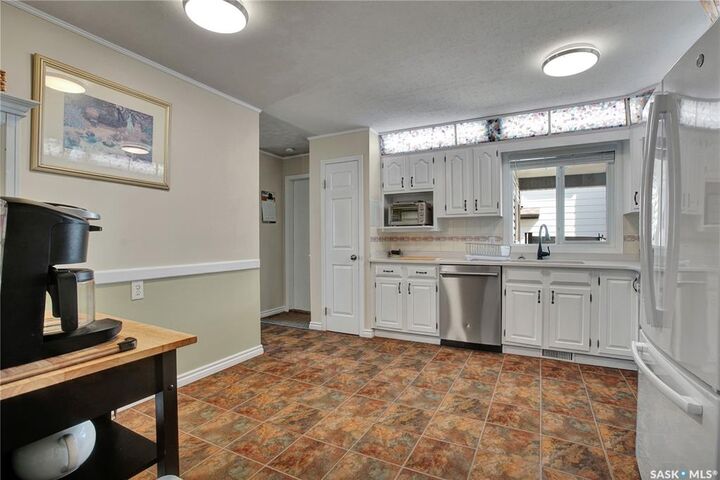 Property Photo:  128 Delaronde Road  SK S7J 3Y3 