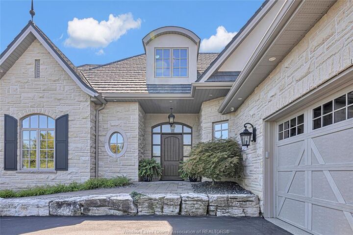 Property Photo: 11245 Riverside Drive ON N8P 1A5