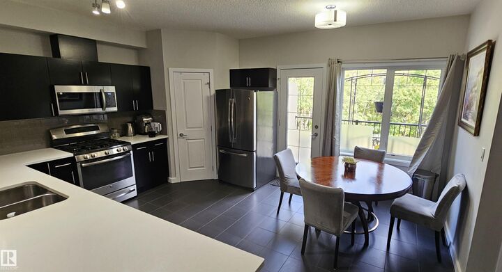 Property Photo:  5873 Mullen Place NW 22  AB T6R 0T5 