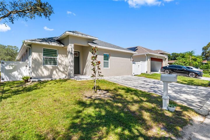 Property Photo:  8920 N Newport Avenue  FL 33604 