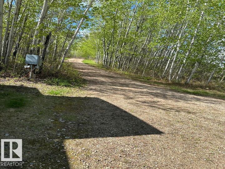 Property Photo:  12002 Twp Rd 605A 544  AB T0A 3A0 