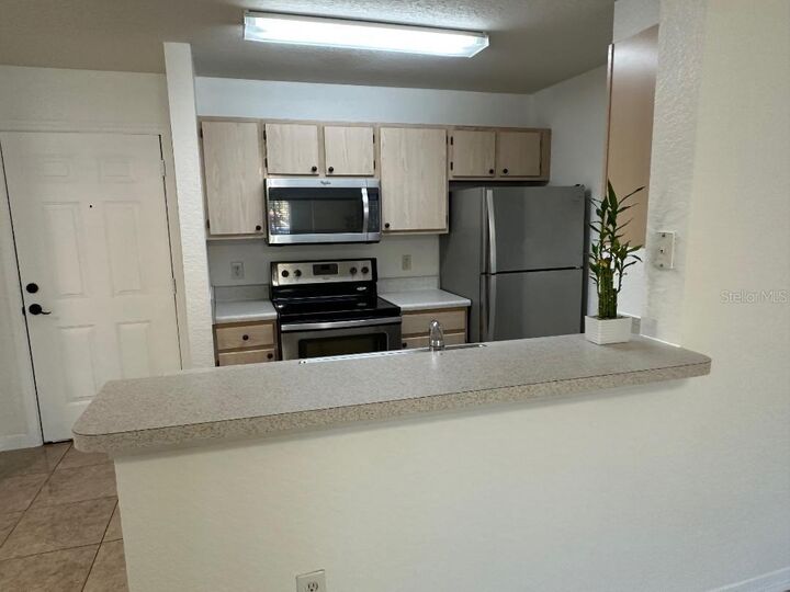 Property Photo: 5479 Vineland Road 9107 FL 32811