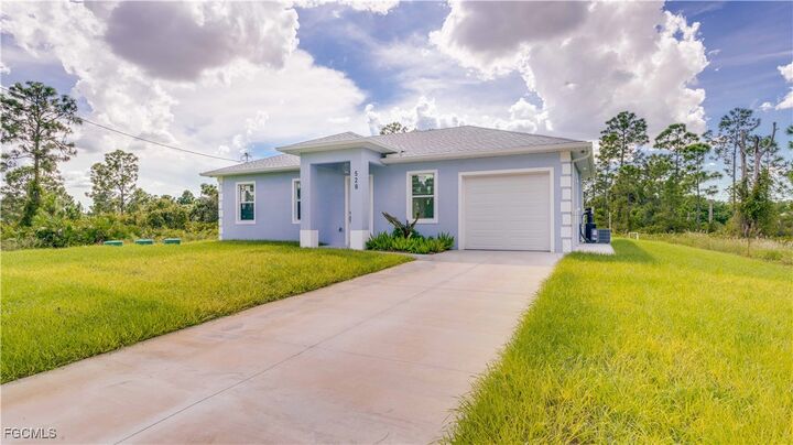 Property Photo:  528 Aspen Avenue S  FL 33974 
