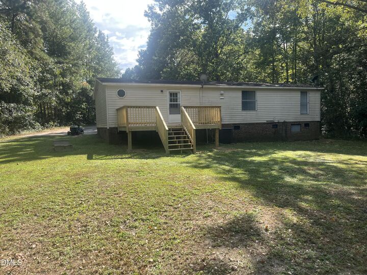 Property Photo:  6844 Bristle Bark Court  NC 27591