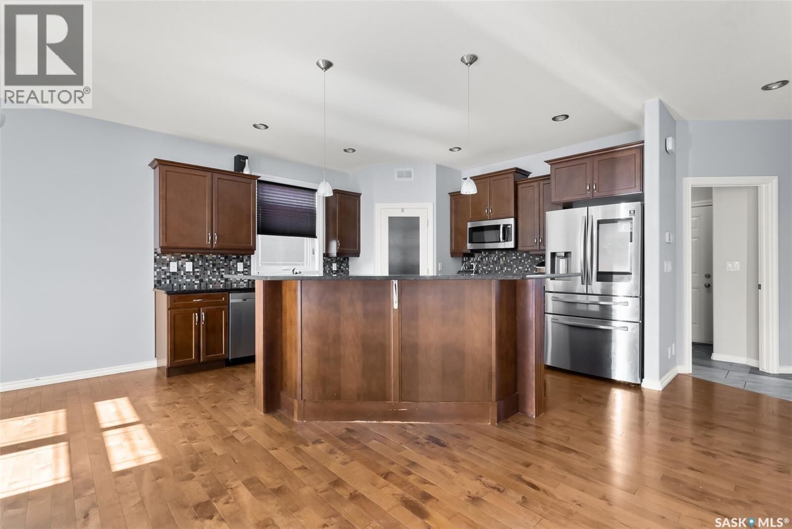 Property Photo: 6925 Maple Ridge Drive SK S4X 4J2