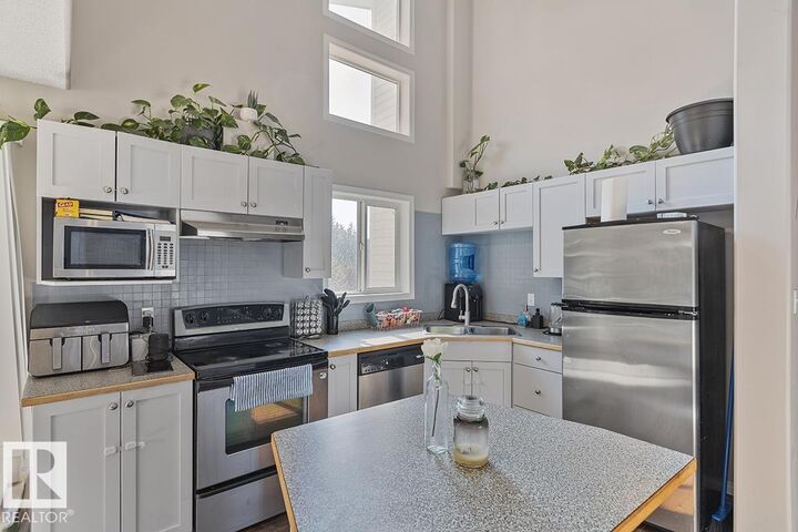 Property Photo:  151 Edwards Drive SW 208  AB T6X 1N5 