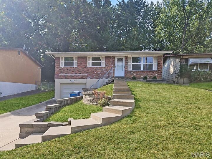 7454 Blanding Drive  St Louis MO 63135 photo