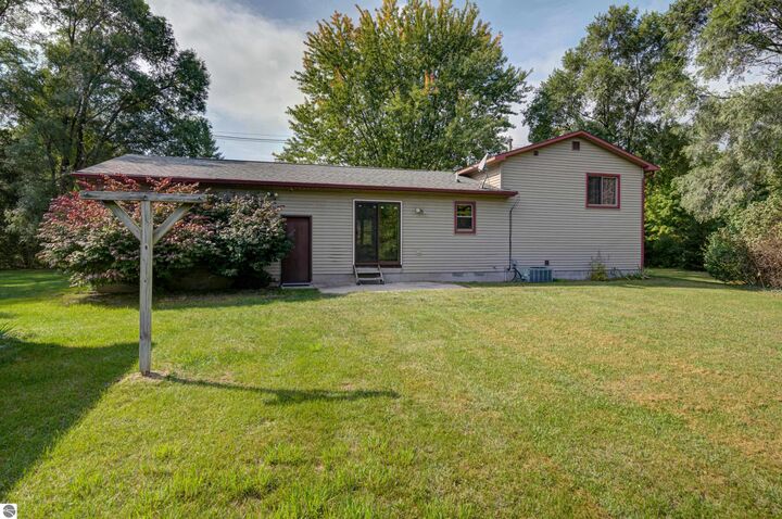 Property Photo:  2450 W Long Lake Road  MI 49685 