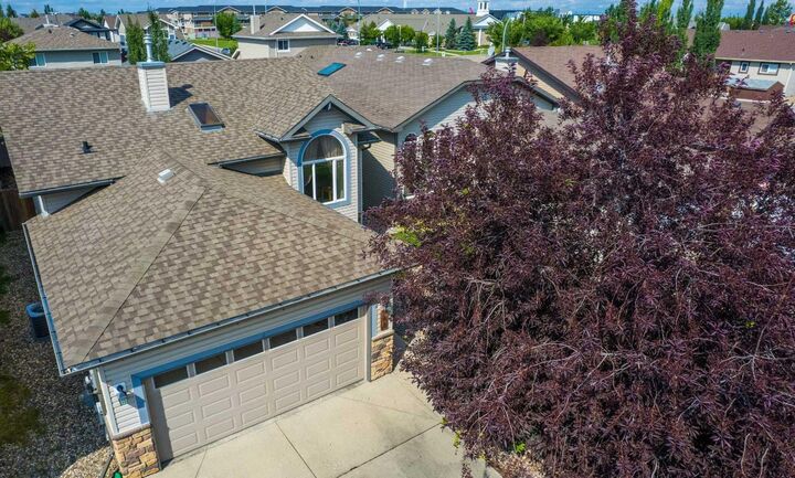 Property Photo:  208 Silkstone Bay W  AB T1J 2A2 