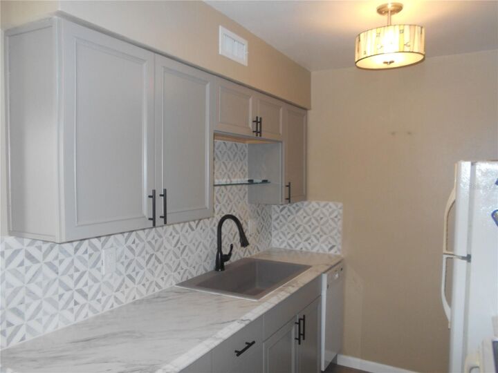 Property Photo: 5771 Peregrine Avenue A01 FL 32819
