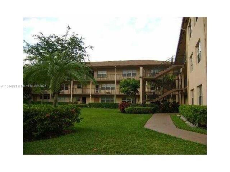 Property Photo: 151 SW 134th Way 212N FL 33027