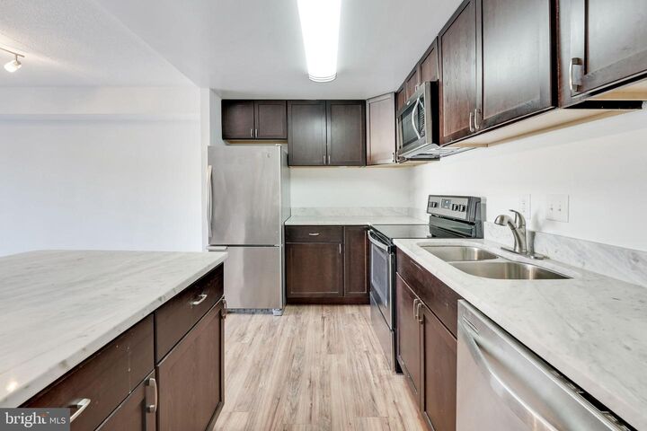 Property Photo:  6300 Stevenson Avenue 120  VA 22304 