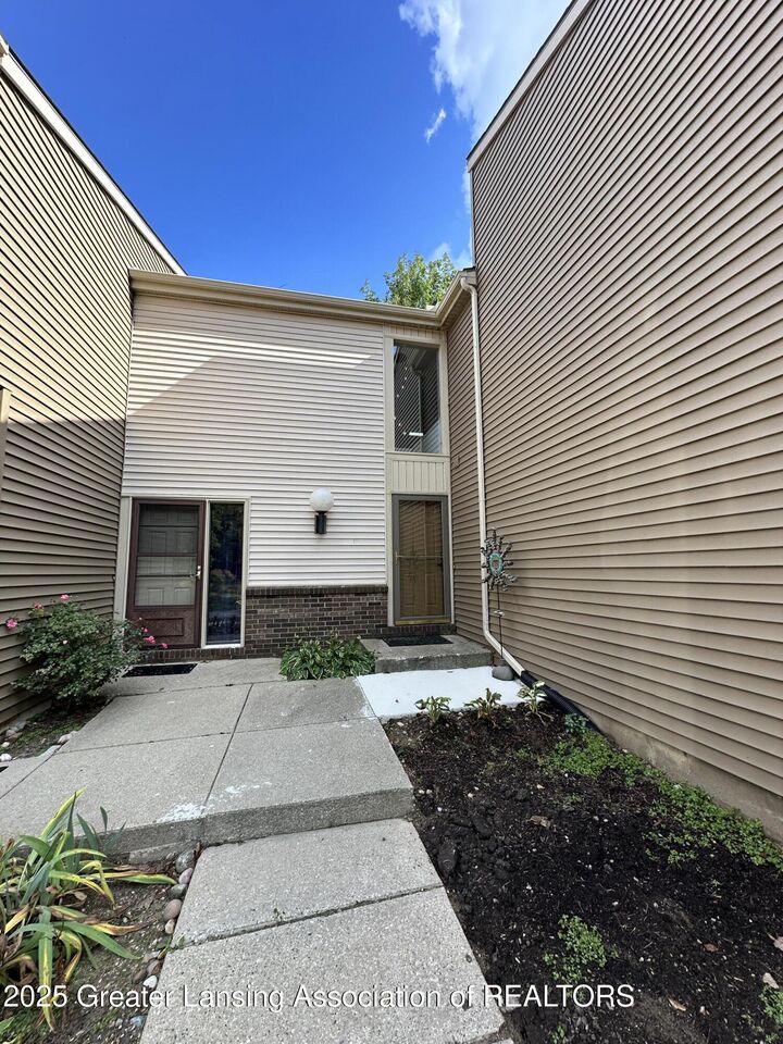 Property Photo:  5724 Lebaron Court  MI 48823 