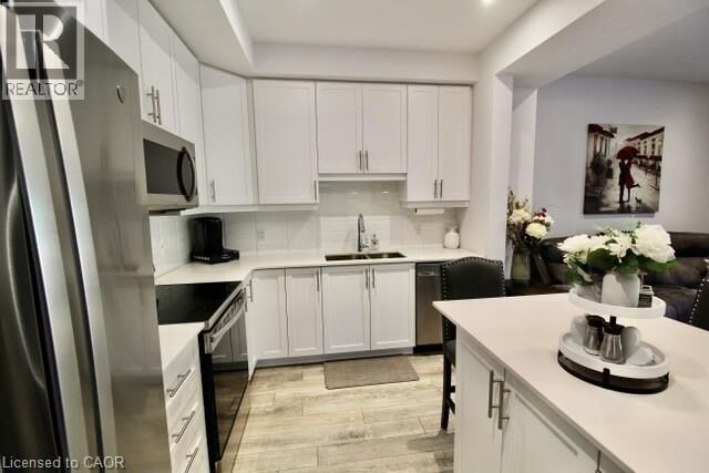 Property Photo:  5080 Connor Drive 10  ON L3J 0T3 