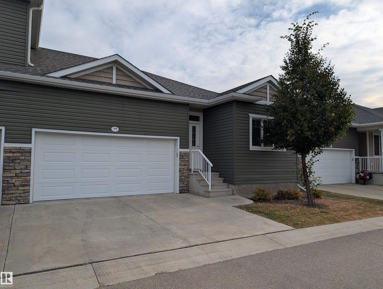 Property Photo:  18230 104A Street NW 59  AB T5X 0G9 