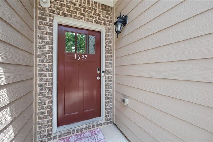 Property Photo:  1697 Paxton Drive SW  GA 30047