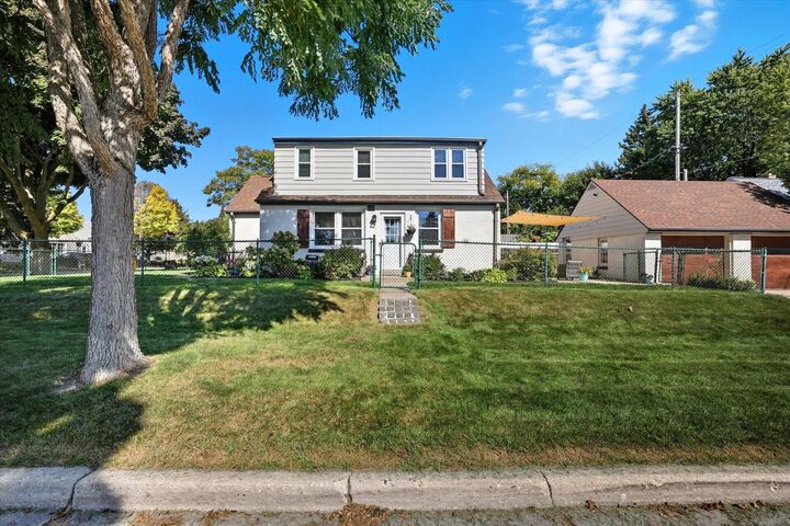 Property Photo:  302 N 111th St  WI 53226