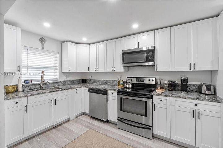 Property Photo:  1101 NW 40th St  FL 33127 