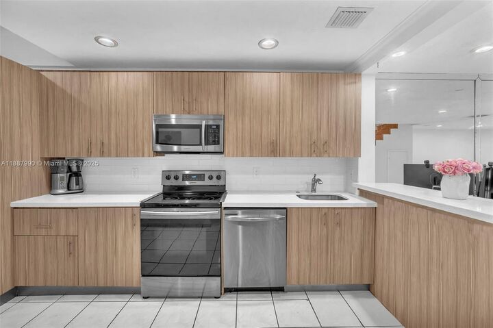 Property Photo:  3825 Estepona Ave 11D5  FL 33178 