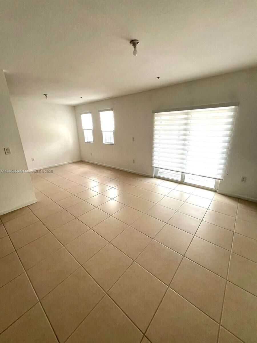 Property Photo:  11601 NW 89th St 211  FL 33178 